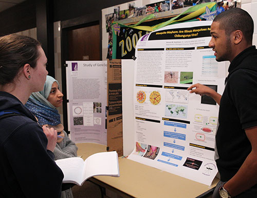 graduate student explaining research