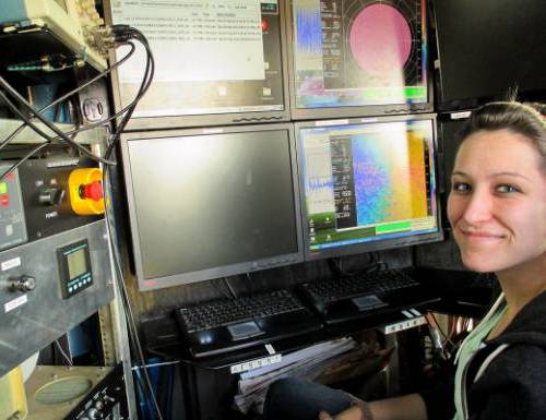 Student working with meteorology equipment