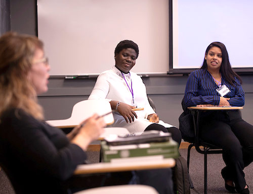 students in a classroom discussion