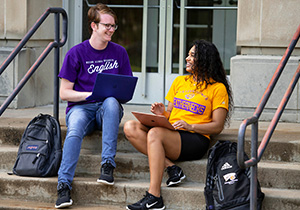 students outside talking