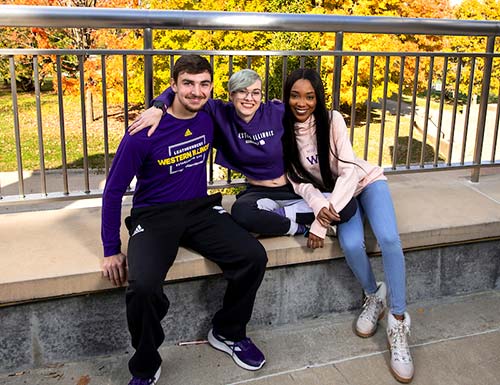 students sitting outside