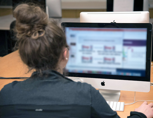 student taking a test on a computer