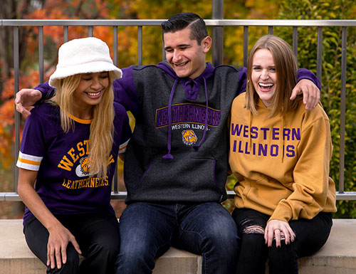 students sitting outside together