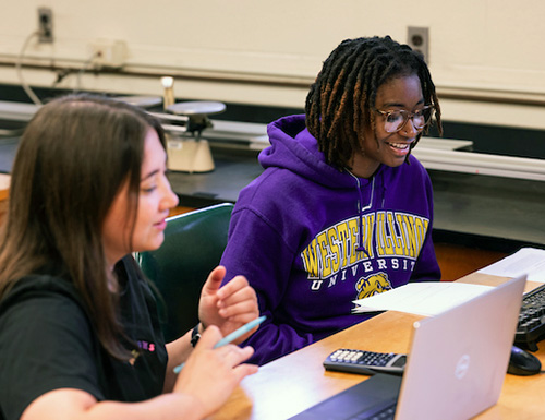 students working in a classroom