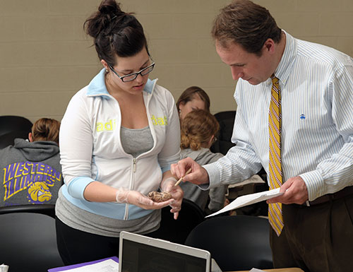 student and professor in class