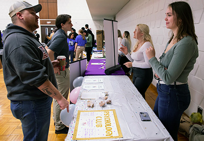 students talking about Psychology Club