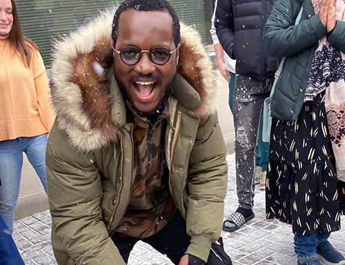 Graduate student experiencing snow for the first time