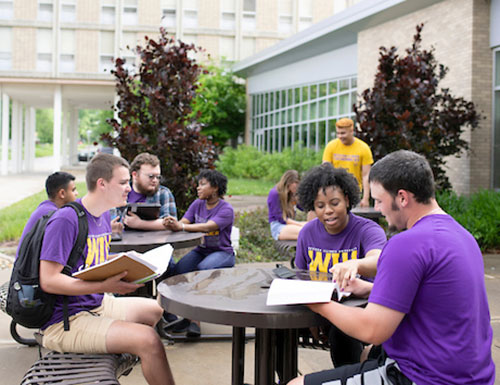 Group of students gathering outside