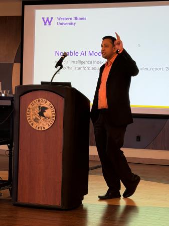  Tahir Khan, WIU associate professor and interim director of the WIU Cybersecurity Center, speaks at the Administrators’ Round Table of Western Illinois Educational Summit.