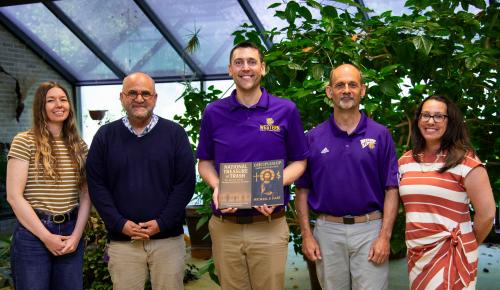 Maj. Michael Hart has established a new scholarship fund to support students participating in WIU's Army ROTC program. From left, Stacia McKeever, associate librarian; Hector Maymi-Sugranes, Dean of University Libraries; Maj. Michael Hart; Tim Roberts, director, School of Humanities; Emily Gillett, director of development. 