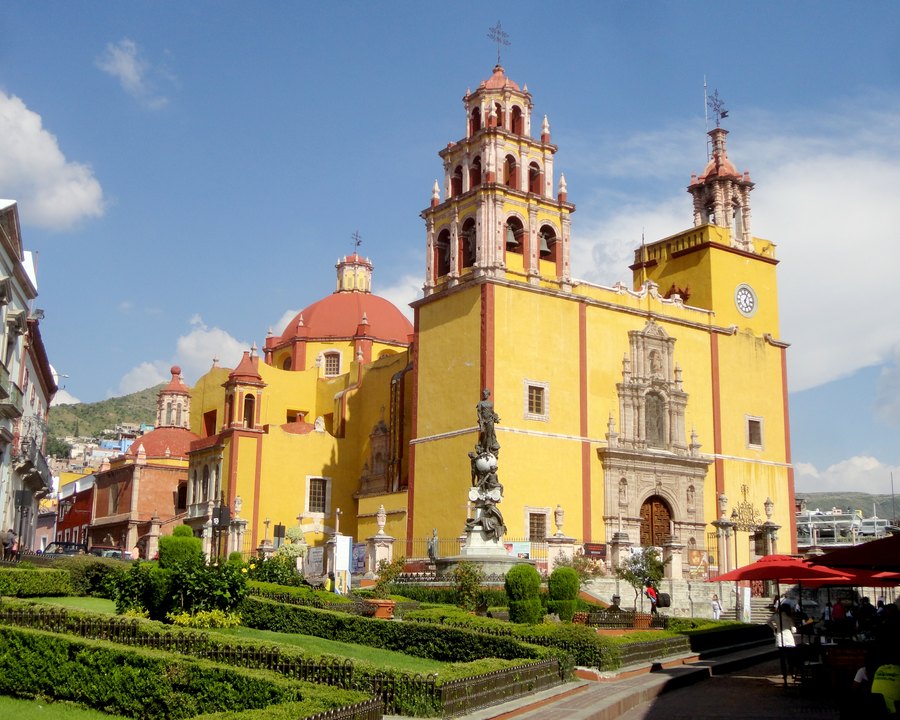Colorful buildings and the yellow basilica in Guanajuato, Mexico