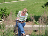 Woman reading a book at Cardinal Court